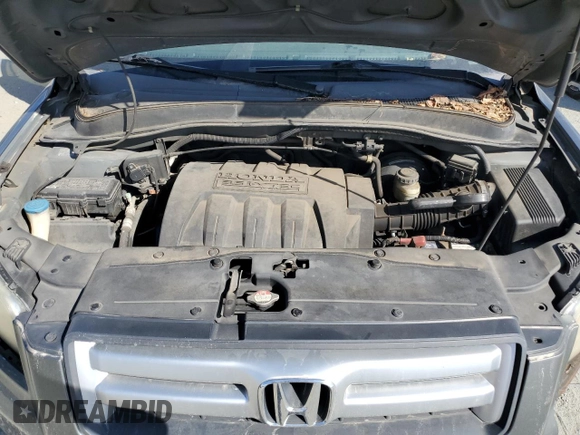 2008 Honda Pilot EX-L z VIN 5FNYF28618B028554, wystawiony jako Copart lot #78627584 z przebiegiem 202 990 mil mil oraz Szkoda całkowita • Salvage title. Historia ofert i sprzedaży dostępna na DreamBid. Obrazek 13.