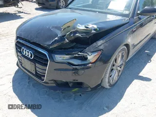 2013 Audi A6 3.0T Premium Plus with VIN WAUGGAFC5DN008487, listed as a IAAI auction lot 42043992 with 168,849 mi miles. Bid and sale history available at carsss.com. Image 6.
