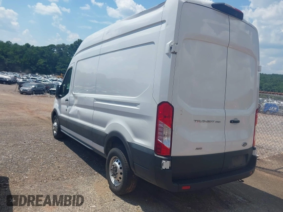 2023 Ford Transit Cargo with VIN 1FTBR2X81PKB38408, listed as a IAAI auction lot 42608271 with 28,384 mi miles and . Bid and sale history available at DreamBid. Image 3.