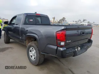 2022 Toyota Tacoma SR with VIN 3TYSX5EN8NT016817, listed as a IAAI auction lot 42140136 with 52,825 mi miles and . Bid and sale history available at DreamBid. Image 3.