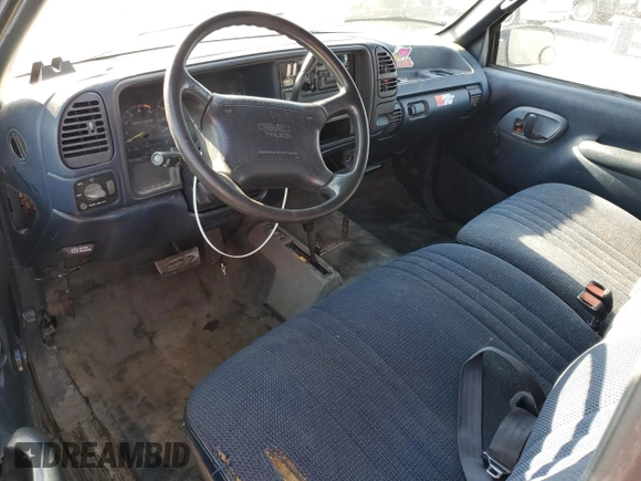 1995 GMC Sierra 1500 z VIN 2GTEK19K3S1591653, wystawiony jako Copart lot #75799124 z przebiegiem 329 311 mil mil oraz Nie do naprawy. Historia ofert i sprzedaży dostępna na DreamBid. Obrazek 8.
