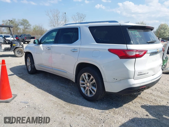 2018 Chevrolet Traverse High Country with VIN 1GNEVKKW9JJ111962, listed as a IAAI auction lot 42118324 with 104,311 mi miles and . Bid and sale history available at DreamBid. Image 3.