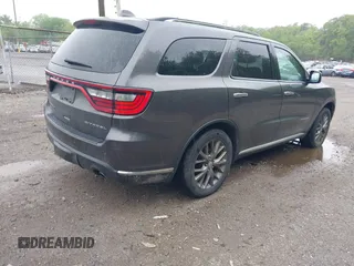 2014 Dodge Durango Citadel with VIN 1C4RDJEG2EC520939, listed as a IAAI auction lot 42272953 with 191,458 mi miles and . Bid and sale history available at DreamBid. Image 4.