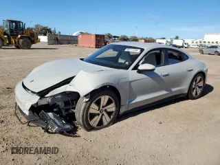 2024 Porsche Taycan z VIN WP0AA2Y17RSA10152, wystawiony jako Copart lot #83117234 z przebiegiem Nie podano mil oraz Szkody całkowita. Historia ofert i sprzedaży dostępna na DreamBid. Obrazek 1.