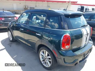 2011 MINI Countryman S with VIN WMWZC5C53BWM10484, listed as a IAAI auction lot 42250690 with 113,534 mi miles and . Bid and sale history available at DreamBid. Image 3.