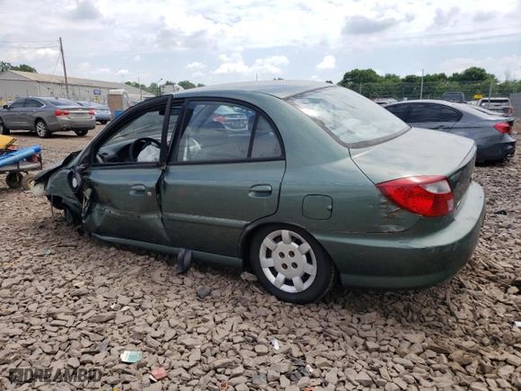 2002 Kia Rio with VIN KNADC123726158130, listed as a Copart auction lot 59104584 with 60,553 mi miles and Salvage Title. Bid and sale history available at carsss.com. Image 2.