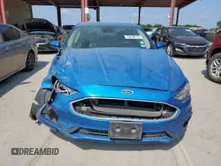 2020 Ford Fusion SE z VIN 3FA6P0HD0LR190390, wystawiony jako Copart lot #57521855 z przebiegiem 125 882 mil mil oraz Czysty tytuł • Clean title. Historia ofert i sprzedaży dostępna na DreamBid. Obrazek 5.