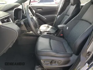 2024 Toyota Corolla Cross Hybrid S with VIN 7MUFBABG7RV043044, listed as a Copart auction lot 61828715 with 10,473 mi miles and Salvage title. Bid and sale history available at DreamBid. Image 7.