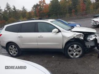 2011 Chevrolet Traverse LTZ with VIN 1GNKVLED5BJ385566, listed as a IAAI auction lot 40530314 with 166,155 mi miles and . Bid and sale history available at DreamBid. Image 13.
