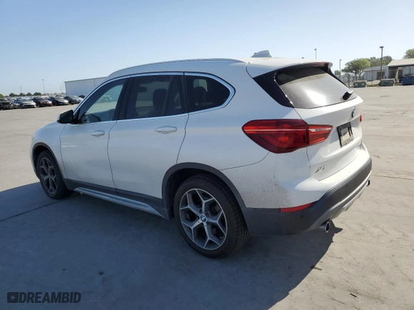 2019 BMW X1 xDrive28i with VIN WBXHT3C53K5L35670, listed as a Copart auction lot 53493245 with 14,201 mi miles and Salvage Title. Bid and sale history available at carsss.com. Image 2.