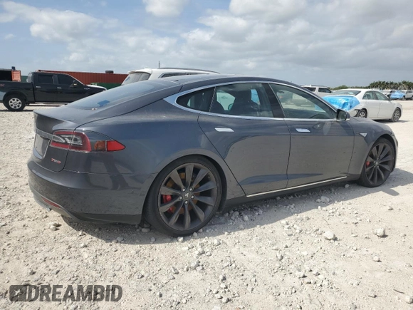 2014 Tesla Model S P85D with VIN 5YJSA1H28EFP62793, listed as a Copart auction lot 52902495 with Not Provided miles and Salvage Title. Bid and sale history available at DreamBid. Image 3.
