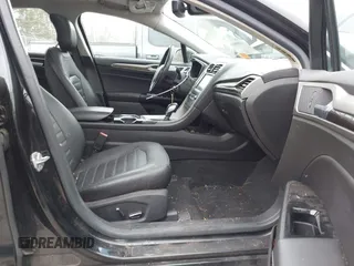 2014 Ford Fusion SE Hybrid with VIN 3FA6P0LU2ER133294, listed as a IAAI auction lot 41696064 with 150,537 mi miles. Bid and sale history available at carsss.com. Image 5.