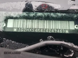 2001 Pontiac Bonneville SE z VIN 1G2HX54K414249469, wystawiony jako Copart lot #46934415 z przebiegiem 112 292 mil mil oraz Szkoda całkowita • Salvage title. Historia ofert i sprzedaży dostępna na DreamBid. Obrazek 14.