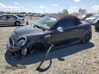 2015 MINI Roadster S z VIN WMWSY3C56FT595760, wystawiony jako Copart lot #59503134 z przebiegiem Nie podano mil oraz Szkody całkowita. Historia ofert i sprzedaży dostępna na DreamBid. Obrazek 1.