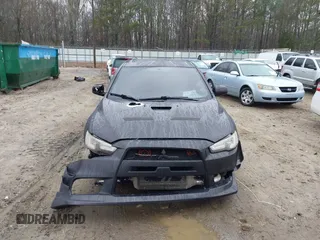 2010 Mitsubishi Lancer Evolution GSR with VIN JA32W8FV1AU012725, listed as a IAAI auction lot 41542629 with 124,347 mi miles and . Bid and sale history available at DreamBid. Image 12.