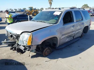 2007 GMC Yukon SLE with VIN 1GKFK130X7J131757, listed as a IAAI auction lot 41237779 with 156,148 mi miles. Bid and sale history available at carsss.com. Image 2.