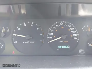 2004 Jeep Grand Cherokee Laredo with VIN 1J4GW48S54C393518, listed as a IAAI auction lot 41984570 with 187,066 mi miles. Bid and sale history available at carsss.com. Image 7.