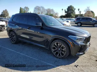 2021 BMW X5 M with VIN 5YMJU0C07M9E05854, listed as a Copart auction lot 38657883 with 14,083 mi miles. Bid and sale history available at carsss.com. Image 4.