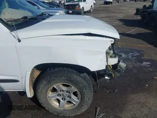 2005 Dodge Dakota SLT with VIN 1D7HW48N85S226460, listed as a IAAI auction lot 41568128 with 213,159 mi miles and . Bid and sale history available at carsss.com. Image 17.