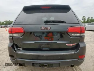 2019 Jeep Grand Cherokee Trailhawk with VIN 1C4RJFLG8KC613582, listed as a Copart auction lot 62901405 with 136,809 mi miles and Salvage title. Bid and sale history available at DreamBid. Image 6.