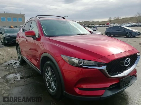 2017 Mazda CX-5 Touring with VIN JM3KFBCL2H0130289, listed as a Copart auction lot 51287885 with 70,170 mi miles and Salvage Title. Bid and sale history available at carsss.com. Image 15.