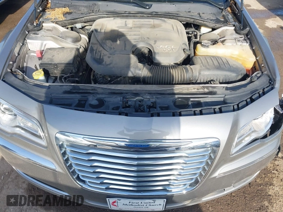 2014 Chrysler 300 with VIN 2C3CCAAG4EH159911, listed as a IAAI auction lot 41963042 with 105,972 mi miles and . Bid and sale history available at DreamBid. Image 10.
