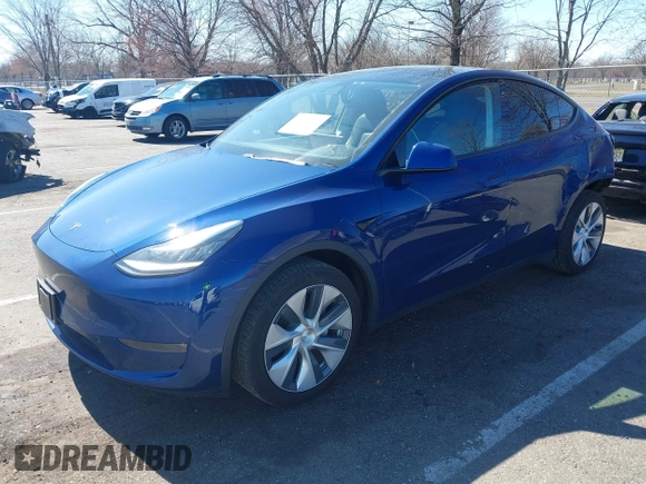 2020 Tesla Model Y Long Range with VIN 5YJYGDEF4LF005534, listed as a IAAI auction lot 41830910 with 32,438 mi miles and . Bid and sale history available at DreamBid. Image 2.