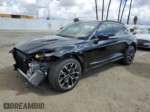 2021 Aston Martin DBX z VIN SCFVUJAW7MTV03341, wystawiony jako Copart lot #71015804 z przebiegiem 12 324 mil mil oraz Szkody całkowita. Historia ofert i sprzedaży dostępna na DreamBid. Obrazek 1.