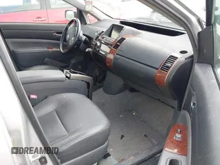 2007 Toyota Prius z VIN JTDKB20U873273942, wystawiony jako IAAI lot #42113046 z przebiegiem 126 635 mil mil oraz . Historia ofert i sprzedaży dostępna na DreamBid. Obrazek 5.