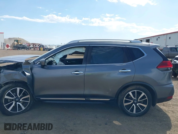 2017 Nissan Rogue SL z VIN JN8AT2MV9HW018040, wystawiony jako IAAI lot #42363401 z przebiegiem 76 020 mil mil oraz . Historia ofert i sprzedaży dostępna na DreamBid. Obrazek 14.