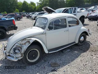 1965 Volkswagen Beetle with VIN 115243692, listed as a Copart auction lot 60070985 with 96,535 mi miles and Salvage title. Bid and sale history available at DreamBid. Image 1.