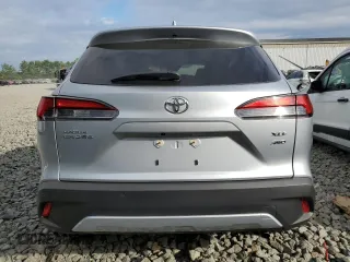 2023 Toyota Corolla Cross XLE with VIN 7MUDAABG6PV078570, listed as a Copart auction lot 65246535 with 21,928 mi miles and Salvage title. Bid and sale history available at DreamBid. Image 6.