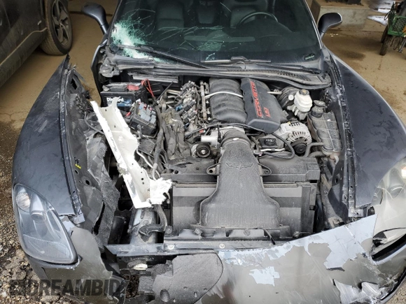 2013 Chevrolet Corvette z VIN 1G1YE3DW8D5107495, wystawiony jako Copart lot #43550355 z przebiegiem Nie podano mil oraz Szkoda całkowita • Salvage title. Historia ofert i sprzedaży dostępna na DreamBid. Obrazek 11.