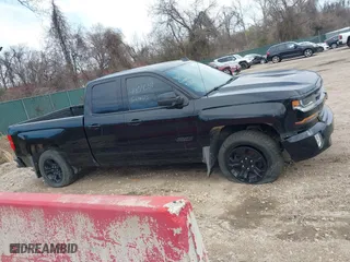 2018 Chevrolet Silverado 1500 LT with VIN 1GCVKREC7JZ165550, listed as a IAAI auction lot 41854559 with 77,647 mi miles. Bid and sale history available at carsss.com. Image 12.