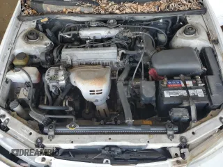 1999 Toyota Camry LE z VIN JT2BG22K3X0317823, wystawiony jako Copart lot #58203965 z przebiegiem 167 587 mil mil oraz Szkoda całkowita • Salvage title. Historia ofert i sprzedaży dostępna na DreamBid. Obrazek 11.