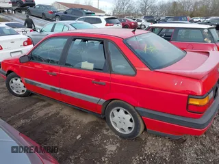 1991 Volkswagen Passat z VIN WVWFB4315ME035691, wystawiony jako IAAI lot #41627396 z przebiegiem 168 795 mil mil oraz . Historia ofert i sprzedaży dostępna na DreamBid. Obrazek 3.