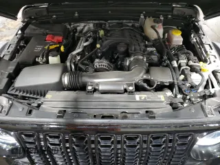 2024 Jeep Wrangler Willys with VIN 1C4PJXDG5RW312580, listed as a Copart auction lot 49144005 with 5,713 mi miles and Salvage Title. Bid and sale history available at carsss.com. Image 12.