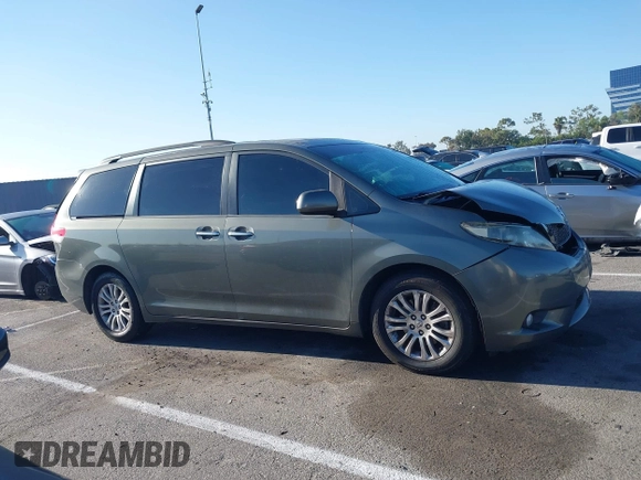 2011 Toyota Sienna XLE AAS with VIN 5TDYK3DC6BS072856, listed as a IAAI auction lot 42684298 with 113,202 mi miles and . Bid and sale history available at DreamBid. Image 13.