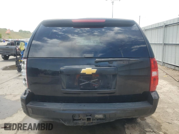 2013 Chevrolet Tahoe Commercial with VIN 1GNSK2E02DR342419, listed as a Copart auction lot 57908885 with 76,486 mi miles and Salvage title. Bid and sale history available at DreamBid. Image 6.