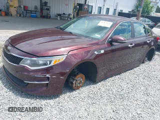 2016 Kia Optima LX with VIN 5XXGT4L3XGG040050, listed as a IAAI auction lot 42363633 with 156,999 mi miles and . Bid and sale history available at DreamBid. Image 2.