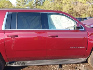2017 Chevrolet Suburban LT with VIN 1GNSKHKC3HR311901, listed as a IAAI auction lot 40883429 with 141,325 mi miles. Bid and sale history available at carsss.com. Image 13.