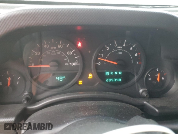 2008 Jeep Wrangler X z VIN 1J8FA24168L646281, wystawiony jako Copart lot #57689895 z przebiegiem 205 348 mil mil oraz Szkoda całkowita • Salvage title. Historia ofert i sprzedaży dostępna na DreamBid. Obrazek 9.