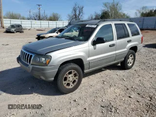 2002 Jeep Grand Cherokee with VIN 1J4GX38S82C178199, listed as a Copart auction lot 48996515 with 299,780 mi miles and Salvage title. Bid and sale history available at DreamBid. Image 1.