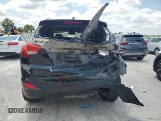 2010 Hyundai Tucson GLS with VIN KM8JU3AC2AU079129, listed as a Copart auction lot 54312875 with 116,659 mi miles and Salvage Title. Bid and sale history available at DreamBid. Image 6.