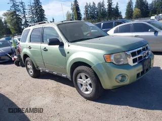 2008 Ford Escape Hybrid with VIN 1FMCU59H48KA68336, listed as a IAAI auction lot 42083411 with 311,958 mi miles. Bid and sale history available at carsss.com. Image 1.