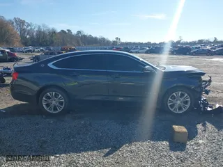 2014 Chevrolet Impala LT with VIN 2G1125S36E9103402, listed as a IAAI auction lot 41389765 with 219,470 mi miles. Bid and sale history available at carsss.com. Image 13.