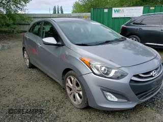 2013 Hyundai Elantra z VIN KMHD35LE3DU075234, wystawiony jako Copart lot #57754185 z przebiegiem 107 040 mil mil oraz Szkoda całkowita • Salvage title. Historia ofert i sprzedaży dostępna na DreamBid. Obrazek 14.