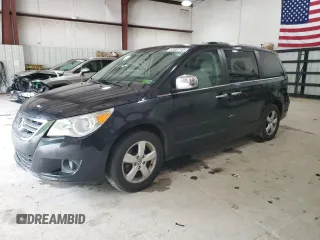 2012 Volkswagen Routan z VIN 2C4RVADG0CR355752, wystawiony jako Copart lot #53687155 z przebiegiem 132 903 mil mil oraz Szkody całkowita. Historia ofert i sprzedaży dostępna na DreamBid. Obrazek 1.