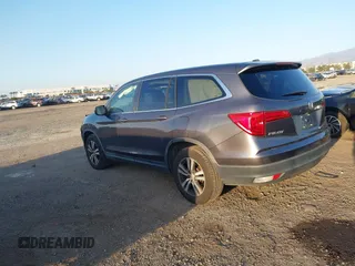2017 Honda Pilot EX-L with VIN 5FNYF5H74HB010026, listed as a IAAI auction lot 41633770 with 170,383 mi miles and . Bid and sale history available at DreamBid. Image 3.