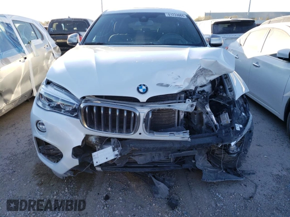 2019 BMW X6 sDrive35i z VIN 5UXKU0C55K0G92734, wystawiony jako Copart lot #81233084 z przebiegiem 60 365 mil mil oraz Szkoda całkowita • Salvage title. Historia ofert i sprzedaży dostępna na DreamBid. Obrazek 5.